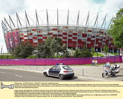 Football - European Championships 2012 - A lone police car waits at the National Stadium, Warsaw 
