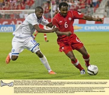 Atiba Hutchinson (R) of Canada vies with Oscar Garcia of Honduras during the 2012 CONCACAF 3rd Round for 2014 FIFA World Cup Qualification match in Toronto, Canada, on June 12, 2012. Canada drew 0-0 with Honduras. (Xinhua Zou Zheng) CANADA-TORONTO-2014 WORLD CUP CONCACAF QUALIFICATION MATCH-CANADA VS HONDURA 