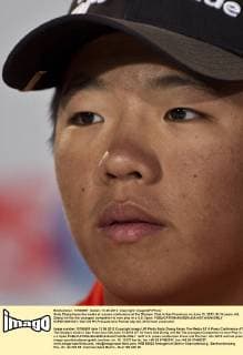Andy Zhang faces the media at a press conference at the Olympic Club in San Francisco on June 13, 2012. At 14 years old, Zhang will be the youngest competitor to ever play in a U.S. Open.  SXP2012061321