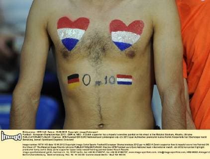 Football - European Championships 2012 - GER vs. NED - A Dutch supporter has a hopeful scoreline painted on his chest at the Metalist Stadium, Kharkiv, Ukraine 