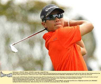 Andy Zhang, the 14-year-old amateur from China, watches his drive off of the 2nd tee box during a practice round prior to the start of the 112th U.S. Open Championship at the Olympic Club in San Francisco, California on June 13, 2012.  SFP20120613211