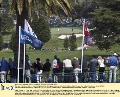 Golf fans watch from club are overlooking the course during a practice round for the U.S. Open at the Olympic Club in San Francisco on June 13, 2012.  SXP2012061324