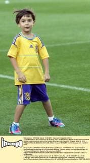 Tymur Shamanov, the instant face of Ukraine, plays football during the Ukrainian national football team s training session held at the Dynamo Stadium, Kyiv, capital of Ukraine, June 13, 2012. - 