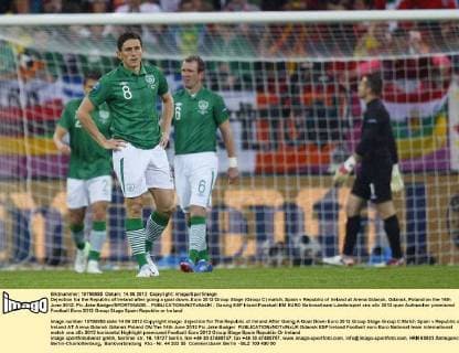 Dejection for the Republic of Ireland after going a goal down..Euro 2012 Group Stage (Group C) match, Spain v Republic of Ireland at Arena Gdansk, Gdansk, Poland on the 14th June 2012. Pic Jake Badger SPORTIMAGE... EDITORIAL USE ONLY. No use with unauthorised audio, video, data, fixture lists, club league logos or live services. Online in-match use limited to 120 images, no video emulation. No use in betting, games or single club league player publications.