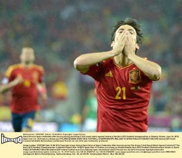 David Silva of Spain celebrates after scoring during the Group C 2nd round match against Ireland at the Euro 2012 football championships in Gdansk, Poland, June 14, 2012. Spain won 4-0. (Xinhua Liu Lihang) (jyc) POLAND-GDANSK-EURO 2012 FOOTBALL CHAMPIONSHIPS-IRELAND VS SPAIN 