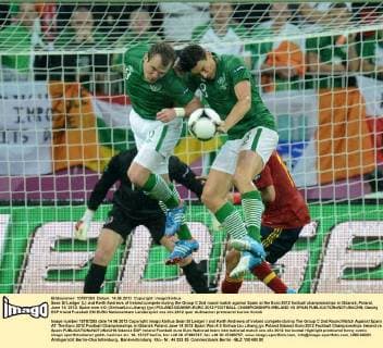 Sean St Ledger (L) and Keith Andrews of Ireland compete during the Group C 2nd round match against Spain at the Euro 2012 football championships in Gdansk, Poland, June 14, 2012. Spain won 4-0. (Xinhua Liu Lihang) (jyc) POLAND-GDANSK-EURO 2012 FOOTBALL CHAMPIONSHIPS-IRELAND VS SPAIN 