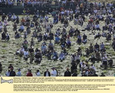 June 14, 2012 - San Francisco, CA, USA - Fans watch golfers from the side of a hill on the 8th hole during the first round of the U.S. Open golf tournament at the Olympic Club in San Francisco, California, on Thursday, June 14, 2012. U.S. OPEN GOLF TOURNAMENT - ZUMAm67