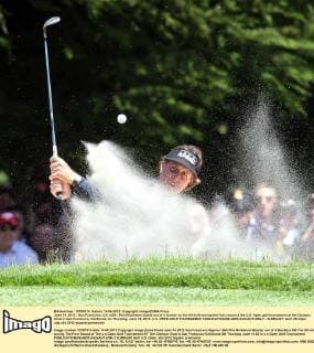 June 14, 2012 - San Francisco, CA, USA - Phil Mickelson blasts out of a bunker on the 6th hole during the first round of the U.S. Open golf tournament at the Olympic Club in San Francisco, California, on Thursday, June 14, 2012. U.S. OPEN GOLF TOURNAMENT - ZUMAm67