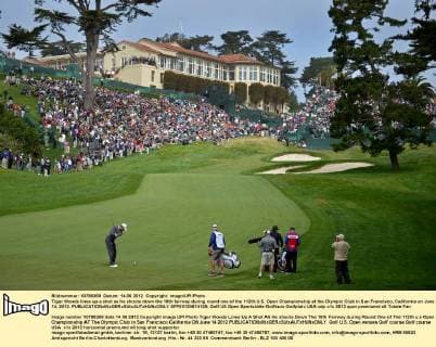 Tiger Woods lines up a shot as he shoots down the 18th fairway during round one of the 112th U.S. Open Championship at the Olympic Club in San Francisco, California on June 14, 2012.  SFP20120614125