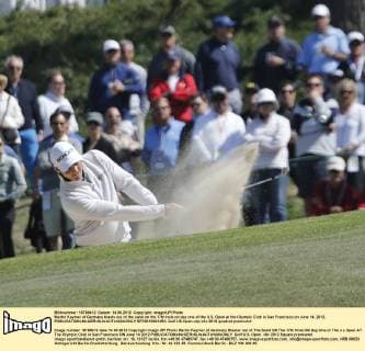 Martin Kaymer of Germany blasts out of the sand on the 17th hole on day one of the U.S. Open at the Olympic Club in San Francisco on June 14, 2012.  SFP2012061453
