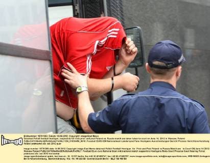 Detained Polish football hooligan, resposible for riots prior and post Poland vs. Russia match are taken taken to court on June 14, 2012 in Warsaw, Poland  EN_01033450_0010