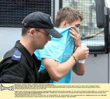 Detained Polish football hooligan, resposible for riots prior and post Poland vs. Russia match are taken taken to court on June 14, 2012 in Warsaw, Poland  EN_01033450_0022