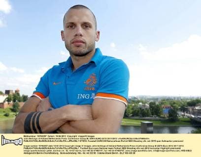 John Heitinga of Holland Netherlands Press Conference Group B: UEFA EURO 2012 2011 2012 xVIxMAURICExVANxSTEENxIVx 977618