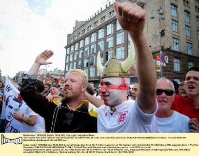 The football fans of the national team of England in the UEFA EURO 2012 fan zone in the Kyiv downtown. 