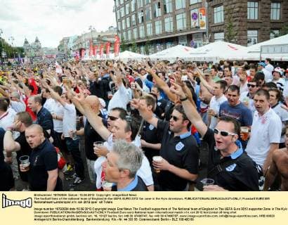 The football fans of the national team of England in the UEFA EURO 2012 fan zone in the Kyiv downtown. 