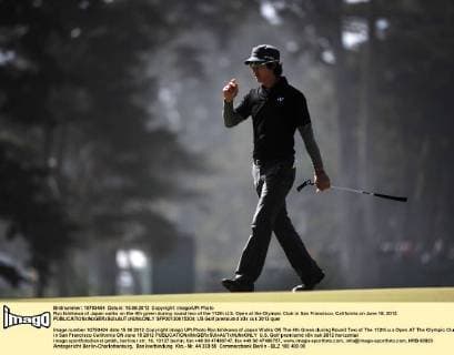 Ryo Ishikawa of Japan walks on the 4th green during round two of the 112th U.S. Open at the Olympic Club in San Francisco, California on June 15, 2012.  SFP20120615304