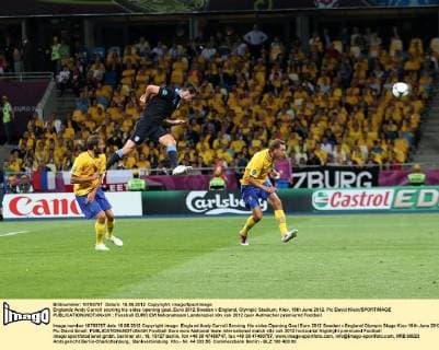 Englands Andy Carroll scoring his sides opening goal..Euro 2012 Sweden v England, Olympic Stadium, Kiev, 15th June 2012. Pic David Klein SPORTIMAGE EDITORIAL USE ONLY. No use with unauthorised audio, video, data, fixture lists, club league logos or live services. Online in-match use limited to 120 images, no video emulation. No use in betting, games or single club league player publications.