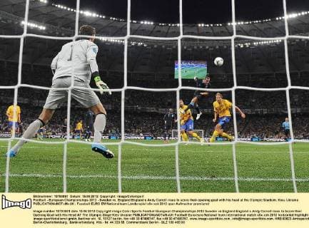 Football - European Championships 2012 - Sweden vs. England England s Andy Carroll rises to score their opening goal with his head at the Olympic Stadium, Kiev, Ukraine 