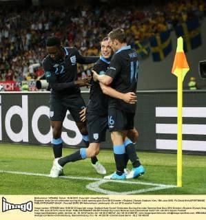 Englands Andy Carroll celebrates scoring his sides opening goal..Euro 2012 Sweden v England, Olympic Stadium, Kiev, 15th June 2012. Pic David Klein SPORTIMAGE EDITORIAL USE ONLY. No use with unauthorised audio, video, data, fixture lists, club league logos or live services. Online in-match use limited to 120 images, no video emulation. No use in betting, games or single club league player publications.