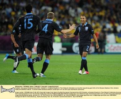 Football - European Championships 2012 - Sweden vs. England England s Theo Walcott celebrates scoring their equalising goal (2-2) at the Olympic Stadium, Kiev, Ukraine 