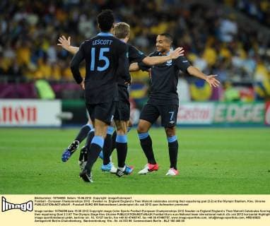 Football - European Championships 2012 - Sweden vs. England England s Theo Walcott celebrates scoring their equalising goal (2-2) at the Olympic Stadium, Kiev, Ukraine 