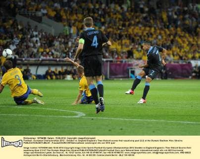 Football - European Championships 2012 - Sweden vs. England England s Theo Walcott scores their equalising goal (2-2) at the Olympic Stadium, Kiev, Ukraine 