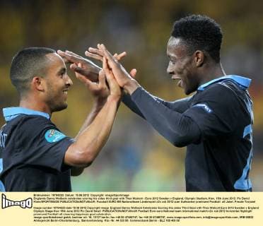Englands Danny Welbeck celebrates scoring his sides third goal with Theo Walcott - Euro 2012 Sweden v England, Olympic Stadium, Kiev, 15th June 2012. Pic David Klein SPORTIMAGE EDITORIAL USE ONLY. No use with unauthorised audio, video, data, fixture lists, club league logos or live services. Online in-match use limited to 120 images, no video emulation. No use in betting, games or single club league player publications.