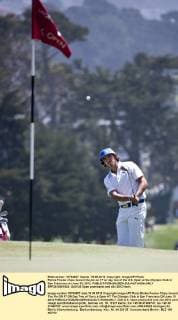 Rickie Fowler chips toward the pin on 17 on day two of the U.S. Open at the Olympic Club in San Francisco on June 15, 2012.  SFP2012061524