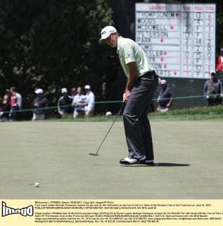 First round leader Michael Thompson misses his par putt on the 14th green on day two of the U.S. Open at the Olympic Club in San Francisco on June 15, 2012.  SFP2012061527