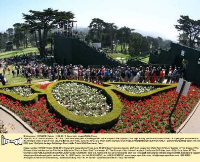 June 15, 2012 - San Francisco, CA, USA - Golf fans walk past a flower garden in the shape of the Olympic Club logo during the second round of the U.S. Open golf tournament at the Olympic Club in San Francisco, California, on Friday, June 15, 2012. U.S. Open at the Olympic Club - ZUMAm67