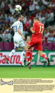 Football - European Championships 2012 - Greece v Russia Aleksei Berezutski,Russia, against Fanis Gekas,Greece, at the National Stadium, Warsaw  4017-4017