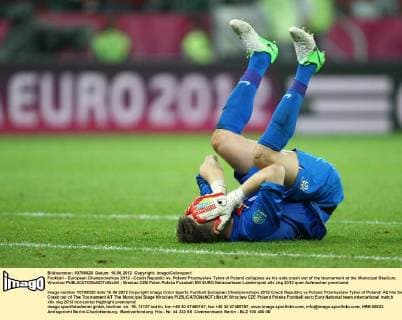 Football - European Championships 2012 - Czech Republic vs. Poland Przemyslaw Tyton of Poland collapses as his side crash out of the tournament at the Municipal Stadium, Wroclaw 