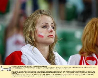 A dejected Poland fan..Euro 2012 Group Stage (Group A) match, at the Municipal Stadium, Wroclawon the 16th June 2012. EDITORIAL USE ONLY. No use with unauthorised audio, video, data, fixture lists, club league logos or live services. Online in-match use limited to 120 images, no video emulation. No use in betting, games or single club league player publications.