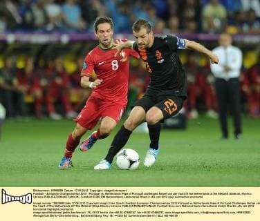 Football - European Championships 2012 - Portugal vs. Netherlands Pepe of Portugal challenges Rafael van der Vaart of the Netherlands at the Metalist Stadium, Kharkiv, Ukraine 