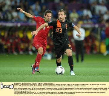 Football - European Championships 2012 - Portugal vs. Netherlands Pepe of Portugal challenges Rafael van der Vaart of the Netherlands at the Metalist Stadium, Kharkiv, Ukraine 