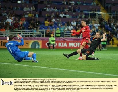 Football - European Championships 2012 - Portugal vs. Netherlands Christiano Ronaldo of Portugal scores their equalising goal (1-1) at the Metalist Stadium, Kharkiv, Ukraine 