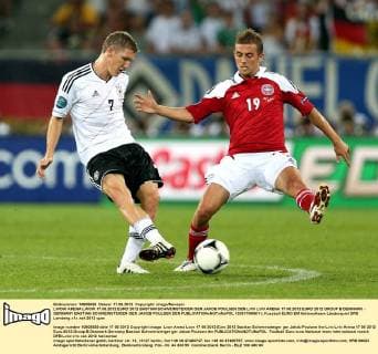LWOW ARENA LWOW 17.06.2012 EURO 2012 BASTIAN SCHWEINSTEIGER GER JAKOB POULSEN DEN LVIV LVIV ARENA 17.06.2012 EURO 2012 GROUP B DENMARK - GERMANY BASTIAN SCHWEINSTEIGER GER JAKOB POULSEN DEN  120617MIN011