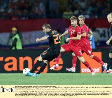 Netherlands Rafael Van Der Vaart scoring his sides opening goal..Euro 2012 Portugal v Netherlands, Metalist Stadium, Kharkiv, 17th June 2012. Pic David Klein SPORTIMAGE EDITORIAL USE ONLY. No use with unauthorised audio, video, data, fixture lists, club league logos or live services. Online in-match use limited to 120 images, no video emulation. No use in betting, games or single club league player publications.