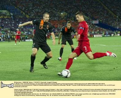 (L-R) Ron Vlaar of Holland,Gregory van der Wiel of Holland,Cristiano Ronaldo of Portugal Portugal v Netherlands Group B: UEFA EURO 2012 2011 2012 xVIxWillemxJanxDijkdrentxIVx 981887