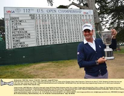 Webb Simpson holds the U.S. Open Trophy after winning the 112th U.S. Open at the Olympic Club in San Francisco, California on June 17, 2012. Simpson finished one-over-par with a four day combined total of 281.  SFP20120617134
