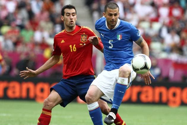 Sergio Busquets and Thiago Motta during European Championship Euro 2012 between Italy and Spain in Gdansk Arena on 10th June 2012 Spain vs Italy Euro 2012