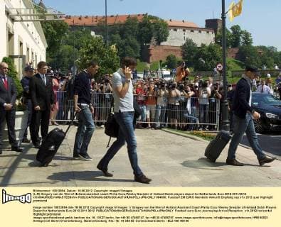 (L-R) Gregory van der Wiel of Holland,assistant coach Philip Cocu,Wesley Sneijder of Holland Dutch players depart for Netherlands Euro 2012 2011 2012 xVIxMAURICExVANxSTEENxIVx 984000