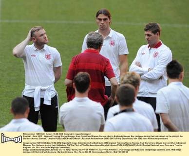 Football - Euro 2012 - England Training Wayne Rooney, Andy Carroll and Steven Gerrard chat to England manager Roy Hodgson during their walkabout on the pitch of the Donbass Arena, Donetsk, Ukraine 