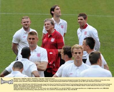 Football - Euro 2012 - England Training Wayne Rooney, Andy Carroll and Steven Gerrard chat to England manager Roy Hodgson during their walkabout on the pitch of the Donbass Arena, Donetsk, Ukraine 