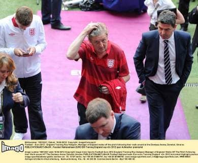 Football - Euro 2012 - England Training Roy Hodgson, Manager of England walks off the pitch following their walk around at the Donbass Arena, Donetsk, Ukraine 
