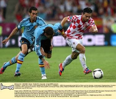 FUSSBALL - EURO 2012, CRO vs ESP DANZIG,POLEN,18.JUN.12 - FUSSBALL - UEFA Europameisterschaft 2012 in Polen und der Ukraine, Länderspiel, Gruppenphase, Kroatien vs Spanien. Bild zeigt Alvaro Arbeloa, Sergio Ramos (ESP) und Danijel Pranjic (CRO). 