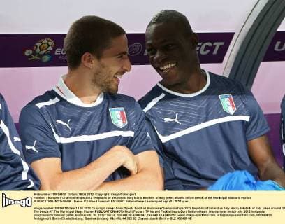 Football - European Championships 2012 - Republic of Ireland vs. Italy Mario Balotelli of Italy jokes around on the bench at the Municipal Stadium, Poznan 