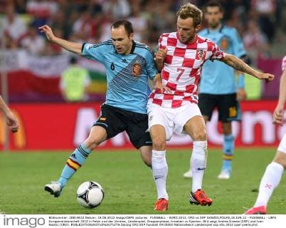 FUSSBALL - EURO 2012, CRO vs ESP DANZIG,POLEN,18.JUN.12 - FUSSBALL - UEFA Europameisterschaft 2012 in Polen und der Ukraine, Länderspiel, Gruppenphase, Kroatien vs Spanien. Bild zeigt Andres Iniesta (ESP) und Ivan Rakitic (CRO). 