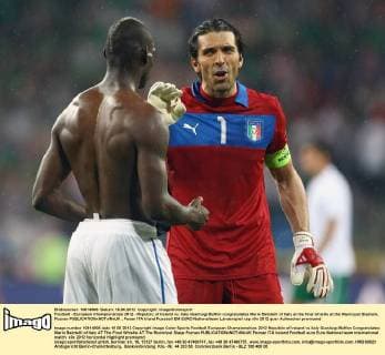 Football - European Championships 2012 - Republic of Ireland vs. Italy Gianluigi Buffon congratulates Mario Balotelli of Italy at the final whistle at the Municipal Stadium, Poznan 