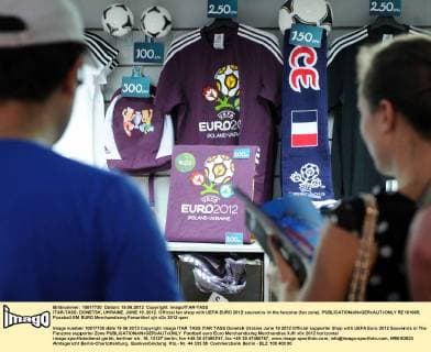 ITAR-TASS: DONETSK, UKRAINE. JUNE 19, 2012. Official fan shop with UEFA EURO 2012 souvenirs in the fanzone (fan zone).  RE101665